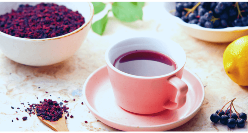 aronia berry tea in cup with loose tea