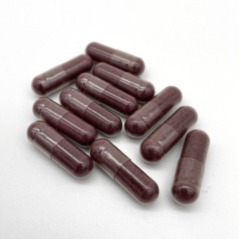 Organic Aronia supplement with Acerola closeup of capsules
